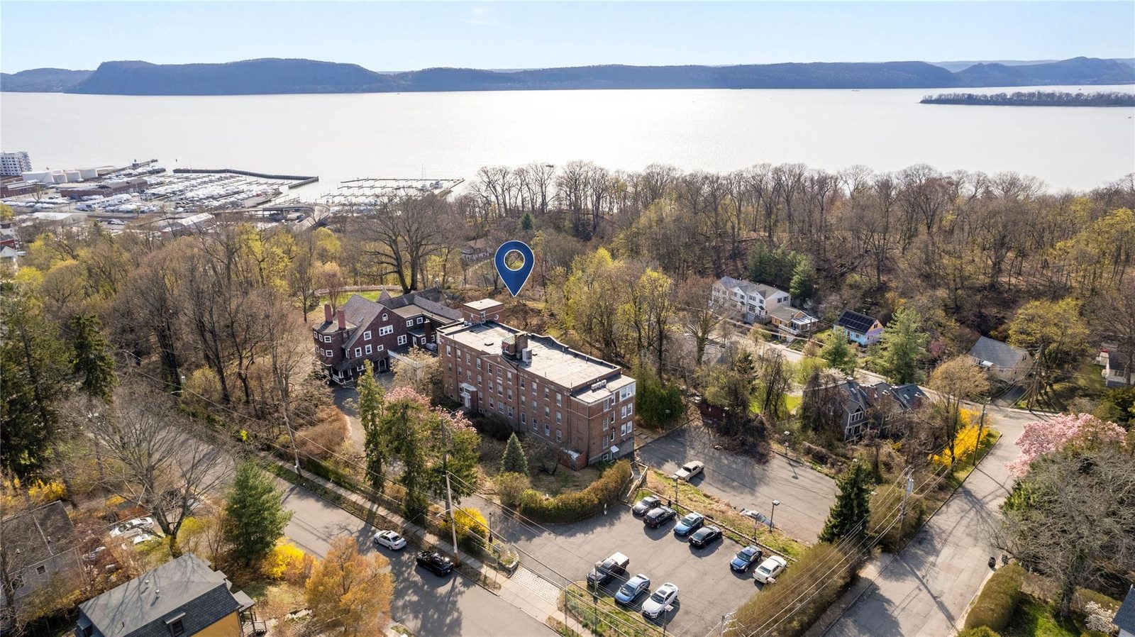 Campus aerial with Hudson River beyond